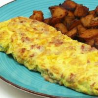Corned Beef Hash Omelette · *Consuming raw or undercooked meats, poultry, seafood, shellfish or eggs may increase your r...
