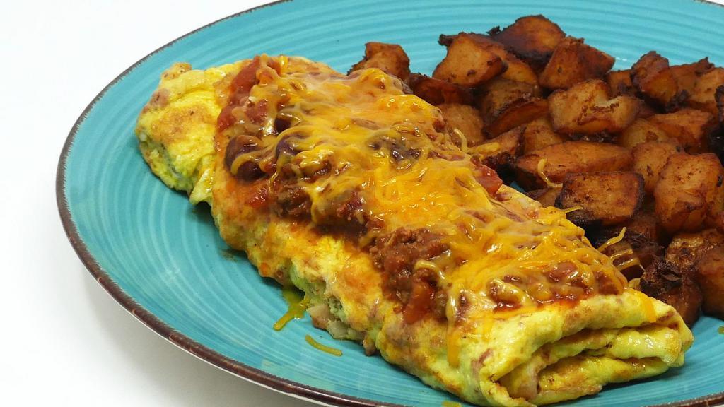 Chili & Cheese Omelette · *Consuming raw or undercooked meats, poultry, seafood, shellfish or eggs may increase your risk of foodborne illness, especially if you have certain medical conditions.