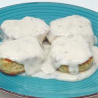 Biscuits And Gravy · Homemade biscuits covered with country-style sausage gravy.