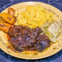 Oxtails · Pieces of beef oxtails marinated and seasoned in Jamaican herbs and spices, steamed over low...