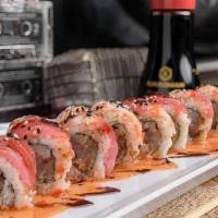 Jam Sesh Roll · Gang’s all here. Yellowtail, albacore tuna and spicy mayo inside, red tuna and crab stick ou...