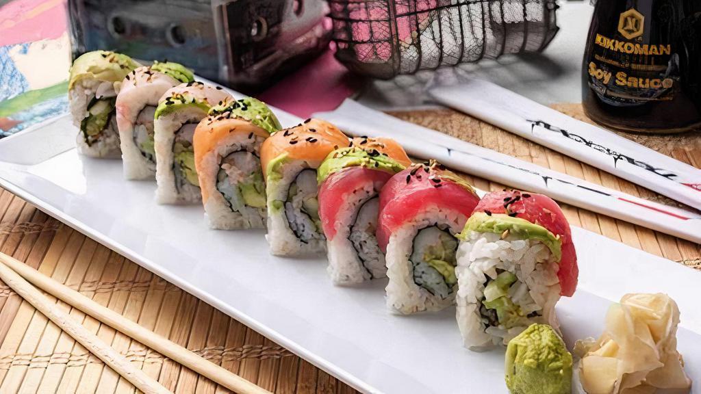 Rainbow Roll · California roll inside, red tuna, fresh salmon, yellowtail and avocado outside, topped with sesame seeds.