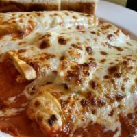 Three Cheese Manicotti · Whole Milk mozzarella, creamy ricotta, & parmesan stuffed into manicotti & topped with our c...