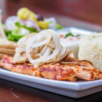Chicken Plaka · Served with  Greek rice, caramelized onion, pita bread, tzatziki sauce, and Greek salad,