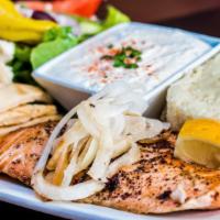 Fresh Salmon Plaka · Served with  Greek rice, caramelized onion, tossed pita bread, tzatziki sauce and Greek salad.