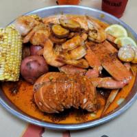 Lobster Special  · One Lobster tail, 1/2 lb snow crab, 1/2lb headless shrimp, 2 potato, 2 corn, 1/4 sausage