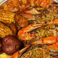 Blue Crab Special · 3 Blue Crabs, 1/2 LB of Headless Shrimp, 1/2 LB of Sausage and 2 corn and 2 potatoes.