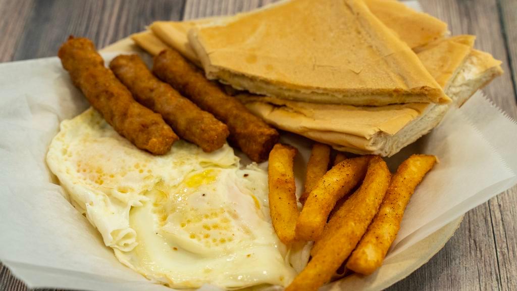 Breakfast Special · Two eggs, bacon or sausage hashbrown, and coffee.