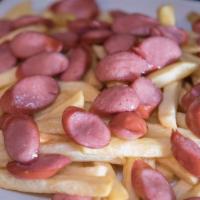 Salchipapa · Peruvian street food: French fries served with slices of beef hot dog and homemade sauce.