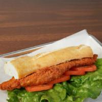 Milanesa Chicken Sandwich · Chicken Milanesa with lettuce, tomato, and mayo served in French baguette.