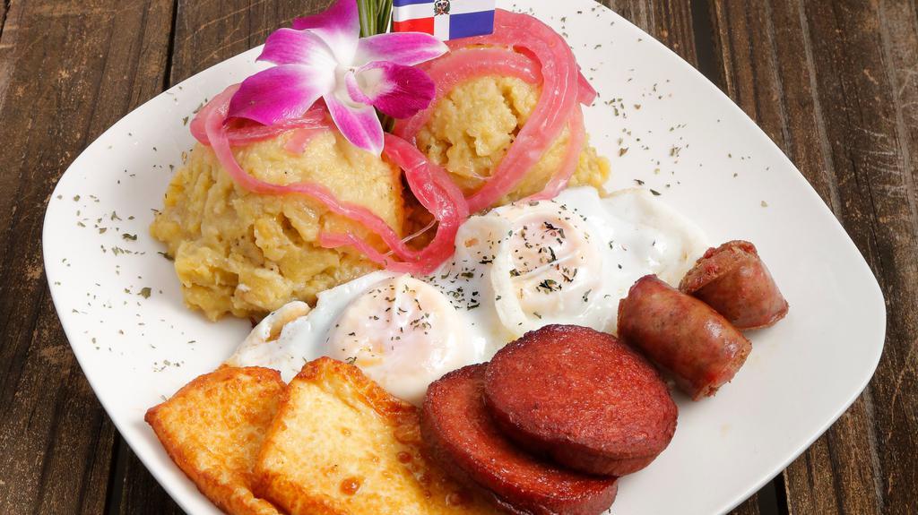 Mangu 4 Golpes · Mangu 4 Golpes 				
Four Sides			
Mashed Green Plantains Accompanied By				
 Two Eggs *Plus The Following* Fried Cheese / Dominican Sausage & Salami
