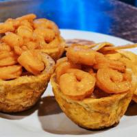 Tostones Rellenos Camarones · Fried Plantain Cups stuffed with your choice of filling