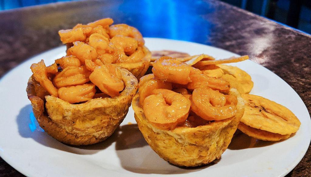Tostones Rellenos Pollo · Fried Plantain Cups stuffed with your choice of filling