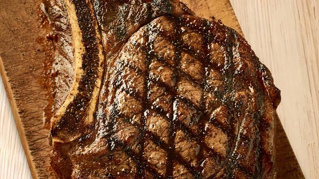 Bone-In Ribeye 18Oz · Bone-in and extra marbled for maximum tenderness. Served with two freshly made sides.