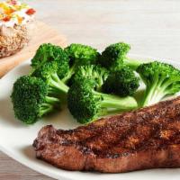 New! Bone-In New York Strip 16Oz · Thick cut, bone-in and full of rich flavor. Served with two freshly made sides.