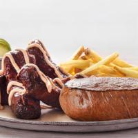 Sirloin & Aussie Twisted Ribs · Our signature center-cut sirloin with Aussie Twisted Ribs. Served with two freshly made sides.