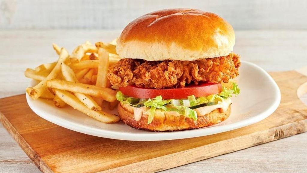 New! Bloomin' Fried Chicken Sandwich · Hand battered in our Bloomin' Onion® seasoning,
fried then drizzled with our spicy signature bloom
sauce with house-made pickles, onion, lettuce
and tomato. Served with one freshly made side.