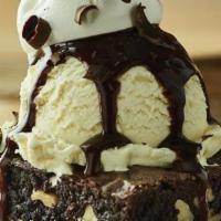 Chocolate Thunder From Down Under · An extra generous pecan brownie topped with rich vanilla ice cream, drizzled with our warm c...