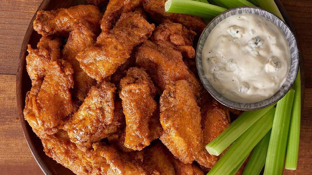 Kookaburra Wings Party Platter · 30 chicken wings tossed in our secret spices served with our Blue Cheese dressing and celery. Choose mild, medium, hot, or dry.