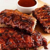 Outback Ribs Party Platter · Three 1/2 racks of Outback Ribs. Smoked, grilled and brushed with a tangy BBQ sauce.