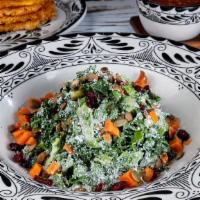 Tacocraft Kale Salad · Vegetarian. Gluten Free.  Avocado, heirloom tomato, pepitas, agave-glazed sweet potato, cran...