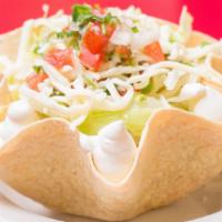 #12 Taco Salad · A crispy tortilla bowl filled with your choice of meat, lettuce, pico, sour cream, guac and ...