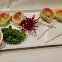 Lollie Pop Roll · *Gluten Free*Cucumber-wrapped roll with daily picked fish (include salmon, hirame, Tuna) and...