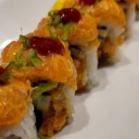 Woman On Top Roll · Spicy Fresh-salmon  roll topped with spicy salmon again, decorated with serrano peppers, and...
