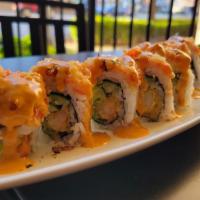 My Fair Lady Roll · Shrimp tempura roll topped with fried crab stick, eel sauce, spicy mayonnaise, and roasted s...