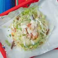Tostada · Four cheese your choice of protein 
Pico lettuce tomato Avocado green salsa and table cream ...