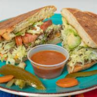 Torta  · Four cheese your choice of protein 
Pico lettuce tomato Avocado green salsa and table cream