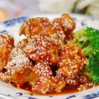 Sesame Chicken · Lightly fried chunks of boneless chicken sautéed in sweet & sour sesame sauce