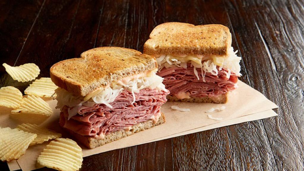 Reuben The Great With Pastrami (Manager'S Special) · A half sandwich served with your choice of a cup of soup, fresh fruit or Mac & Cheese. Hot pastrami, Swiss, sauerkraut, 1000 Island dressing, on toasted marbled rye.