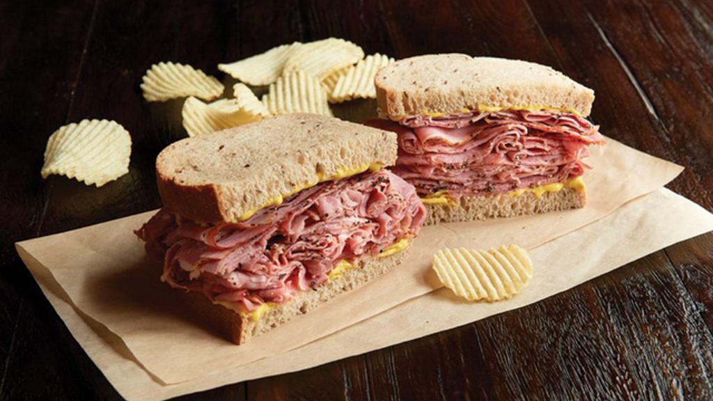 Hot Pastrami Sandwich	Regular · 1/2 pound of hot pastrami. Gluten-free bread, select your spreads and dress it up. Also served with chips or baked chips (150/100 cal) and a pickle (5 cal).