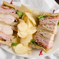 Deli Club Box · Ham and roasted turkey breast, Swiss and cheddar cheese,  bacon, leafy lettuce, and tomato o...