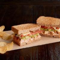 Santa Fe Chicken Sandwich Regular · Grilled, 100% antibiotic-free chicken breast, bacon, Swiss, guacamole, tomato, 1000 Island d...
