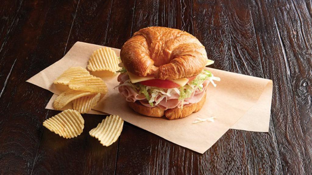 Ham Sandwich Regular · Our ham is nitrite-free and sliced fresh daily. Name your bread, select your spreads and dress it up. Also served with chips or baked chips (150/100 cal) and a pickle (5 cal).