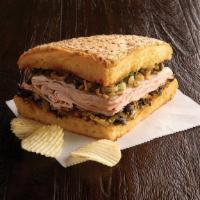 1/4 Roasted Turkey Breast Muffaletta (490 Cal) · A New Orleans original! Grilled, A quarter sandwich with crusty Muffaletta bread spread to t...