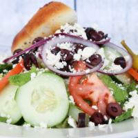 Greek Salad · Feta cheese, kalamata olives, sliced tomatoes, onions, pepperoncini, romaine lettuce and cuc...