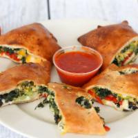 Small Vegetable Stromboli · Spinach, broccoli, roasted peppers, black olives, cheddar and mozzarella.