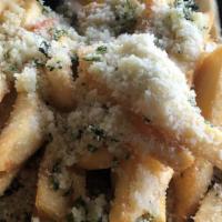 Truffle Fries · tossed in truffle oil, parmesan, side of truffled cheese sauce.