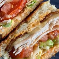 Southwestern Club · roasted turkey breast, smoked bacon, pepper jack cheese, shaved lettuce, tomato, chipotle ma...