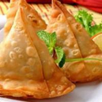 Vegetable Samosas (2 Pieces) · Triangular puffed pastry stuffed with mashed potatoes, green peas, carrots & mildly spiced h...