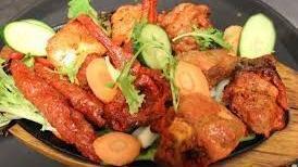 Mixed Tandoori Platter · An assortment of Tandoori specialties, including four different Tandoori items: Chicken Tand...