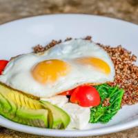 Power Bowl · Sunnyside eggs, avocado, sauteed kale, cherry tomatoes, feta, and quinoa