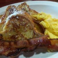 Thick French Toast · Brioche bread and maple syrup. Add two eggs. Add walnuts, caramel or Nutella for additional ...