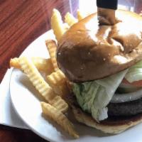 Jumbo Hamburger · Flame-grilled burger, lettuce, tomatoes and onions on a grilled brioche roll with chips and ...