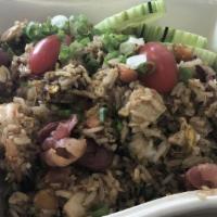 Thai Fried Rice · Most popular. Rice with eggs, peas, carrots, onions topped with scallions, tomatoes and cucu...
