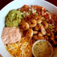 Tacomoli Bowl · Rice, lettuce, pico de gallo, guacamole, chipotle crema, corn salsa, cheese, and our house c...