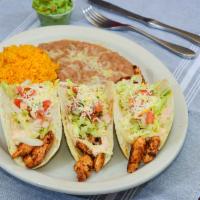 Loaded Tacos · 3 tacos. Choice of protein. Guacamole, Chipotle Cream,  Lettuce, Pico de gallo and Cheese. R...